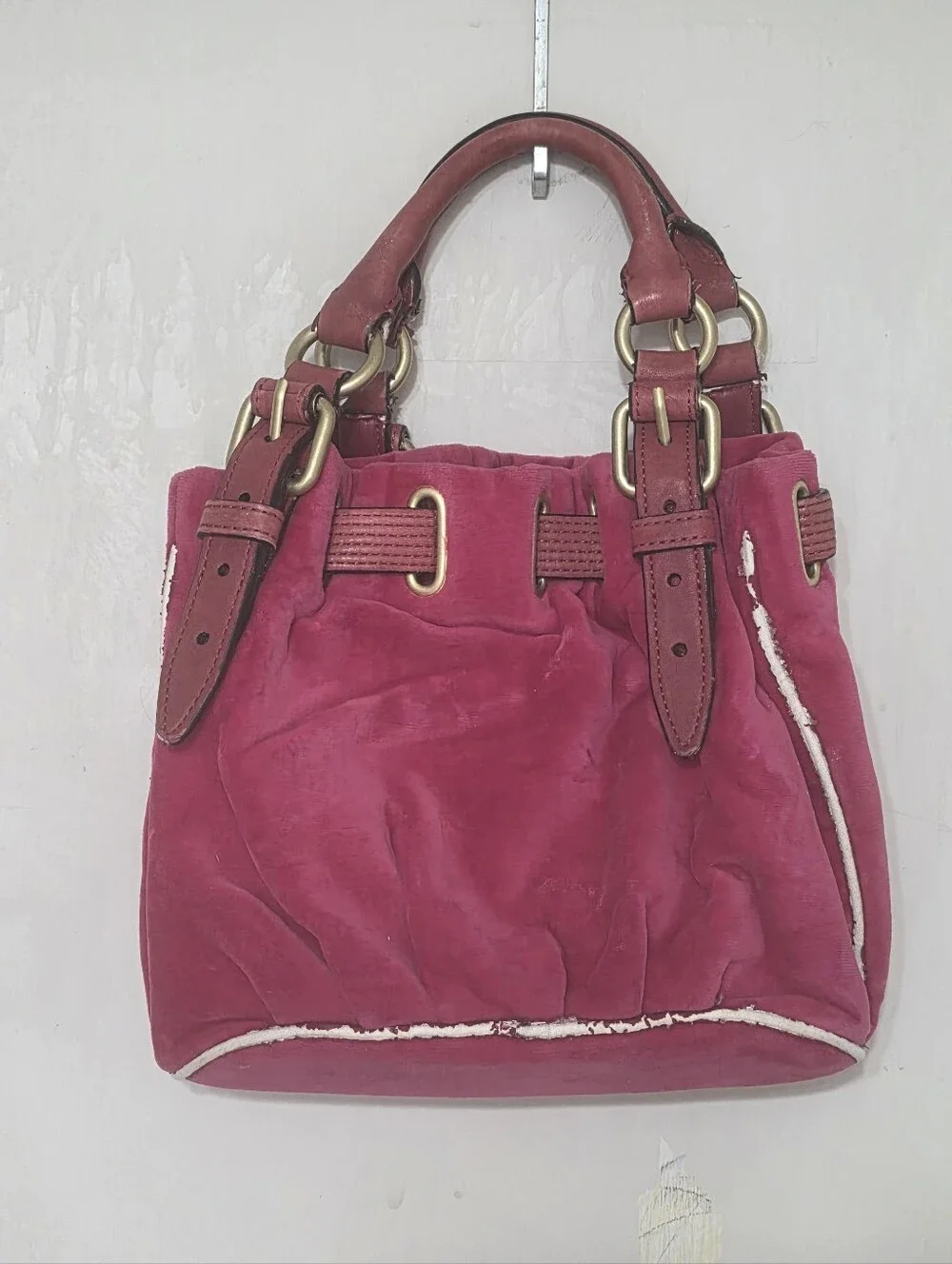 Juicy Couture removed leather